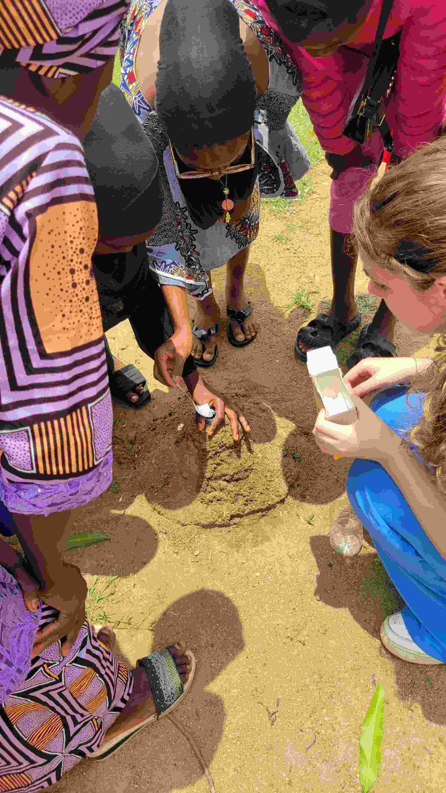 Diverse youth students working on science and technology projects in a bright modern educational setting